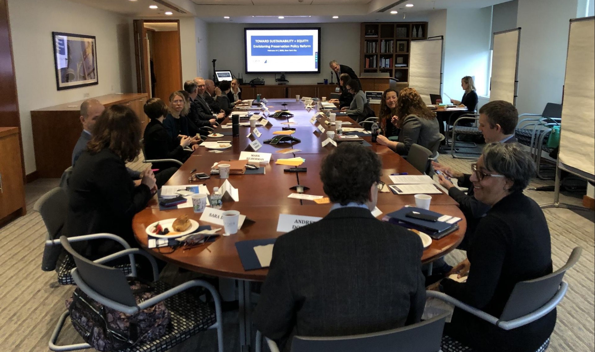 People meeting around conference table
