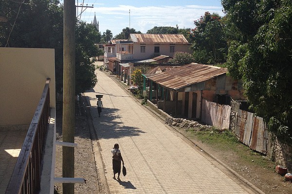 Person walking down street in Haiti